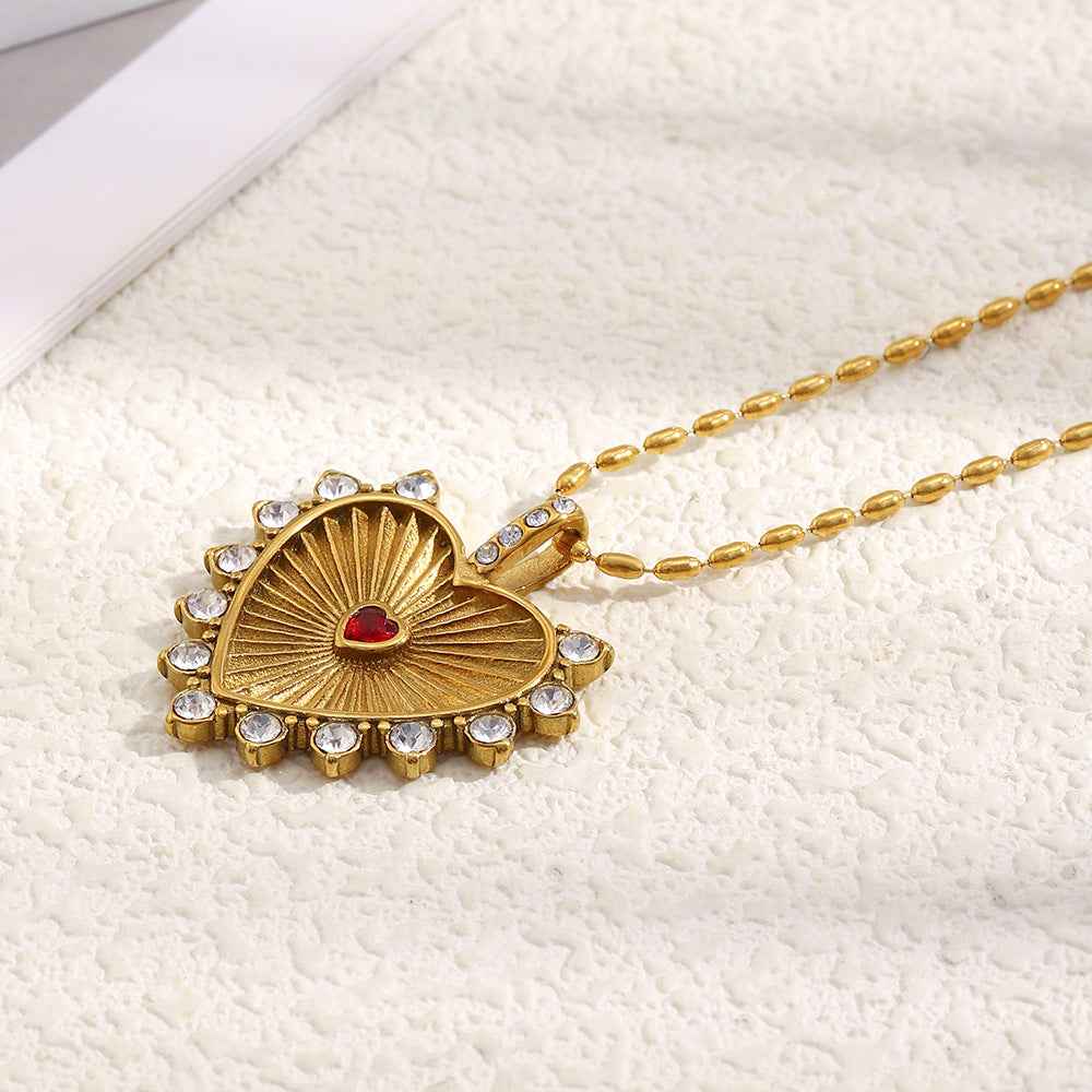 Stainless steel plated 18K gold carved heart-shaped necklace