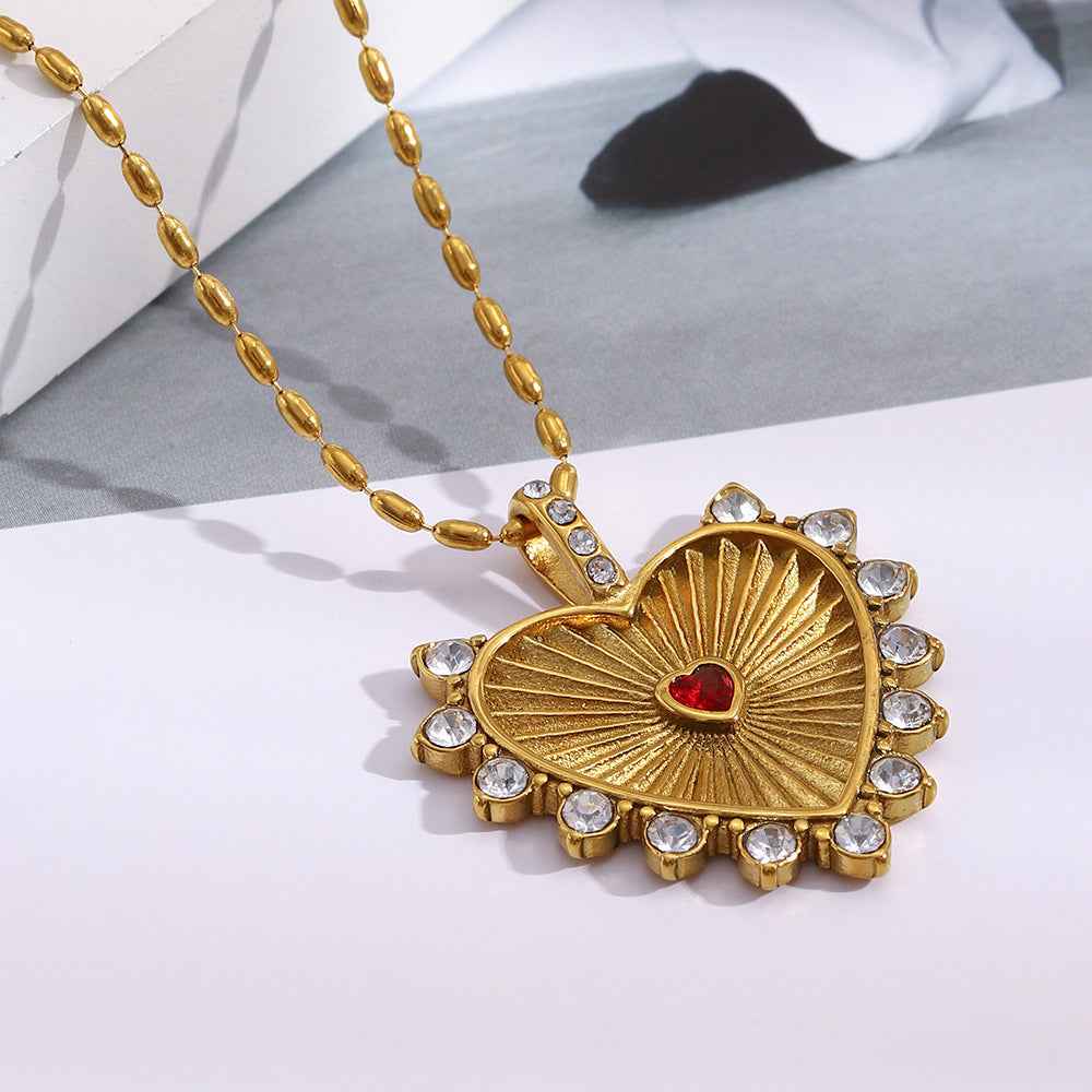 Stainless steel plated 18K gold carved heart-shaped necklace