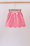 Deep pink scallop hem bow skort