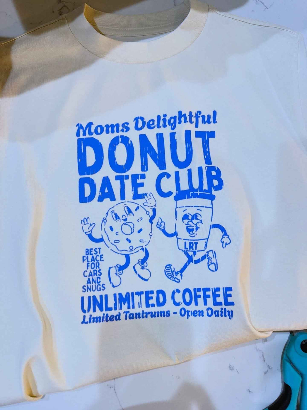 MOMS DONUT DATE CLUB TEE - CREAM (FRONT ONLY)
