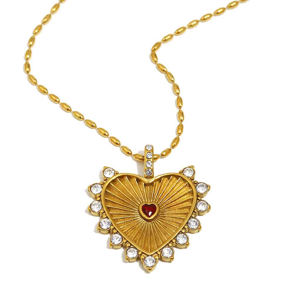 Stainless steel plated 18K gold carved heart-shaped necklace
