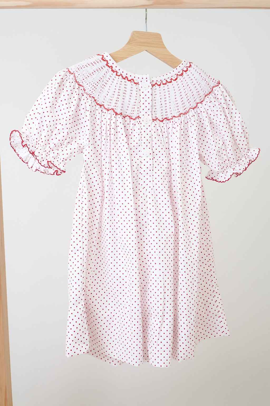 Pink christmas bishop hand smocked dot dress