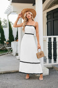 Women's long sleeveless dress with suspenders and pleated lace