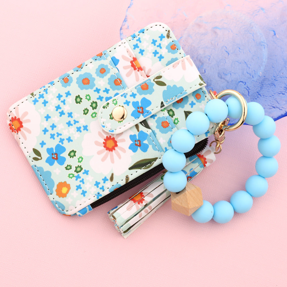 ID bag, silicone bracelet, floral folded edge card bag, TK printed leather wallet, keychain.