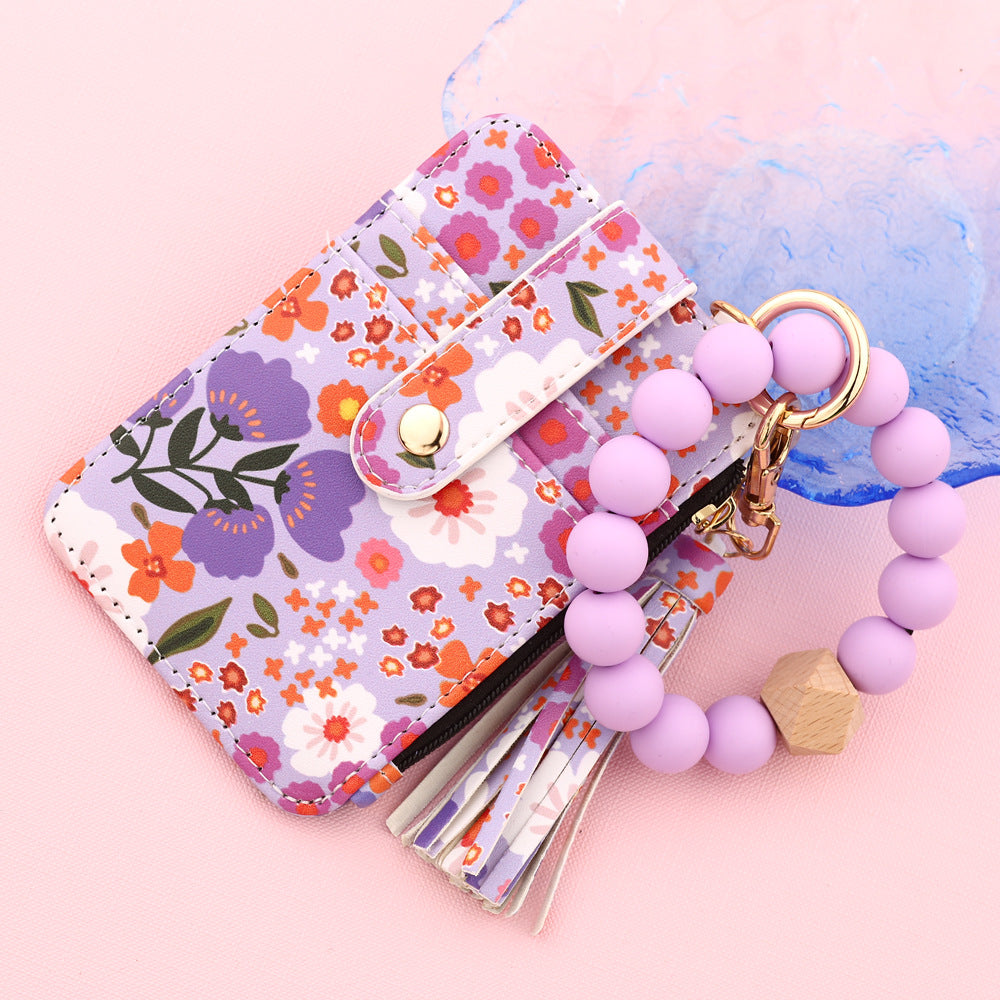 ID bag, silicone bracelet, floral folded edge card bag, TK printed leather wallet, keychain.