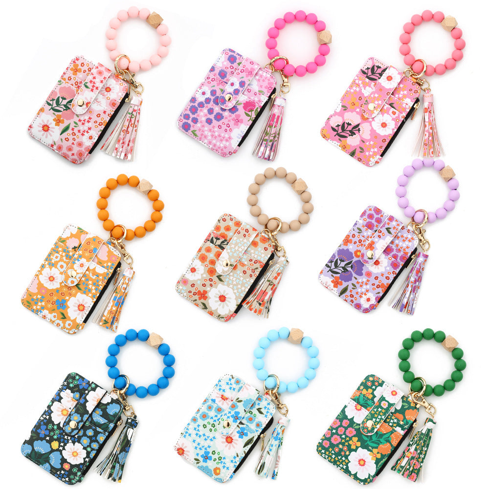 ID bag, silicone bracelet, floral folded edge card bag, TK printed leather wallet, keychain.