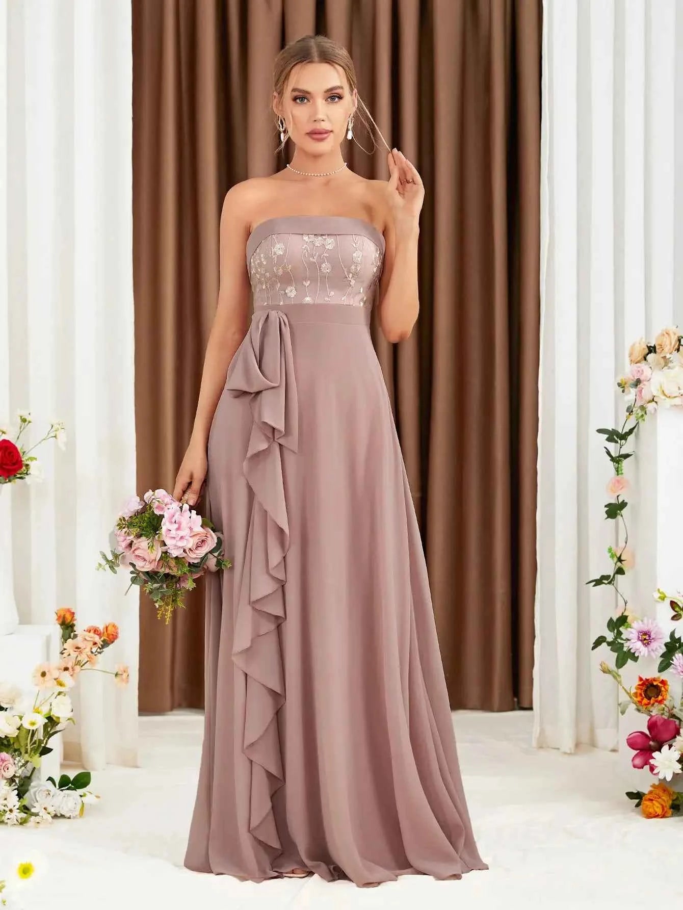 The adult formal dress is wrapped around the chest and decorated with a belt on the back