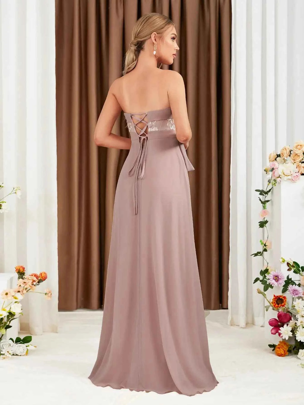 The adult formal dress is wrapped around the chest and decorated with a belt on the back