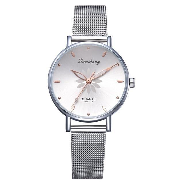 Women's Stylish Elegant Watch With Braided Steel Bracelet With Shiny Background Unique Design Perfect Gif