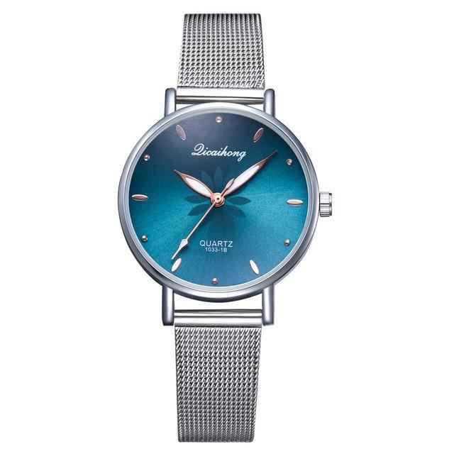 Women's Stylish Elegant Watch With Braided Steel Bracelet With Shiny Background Unique Design Perfect Gif