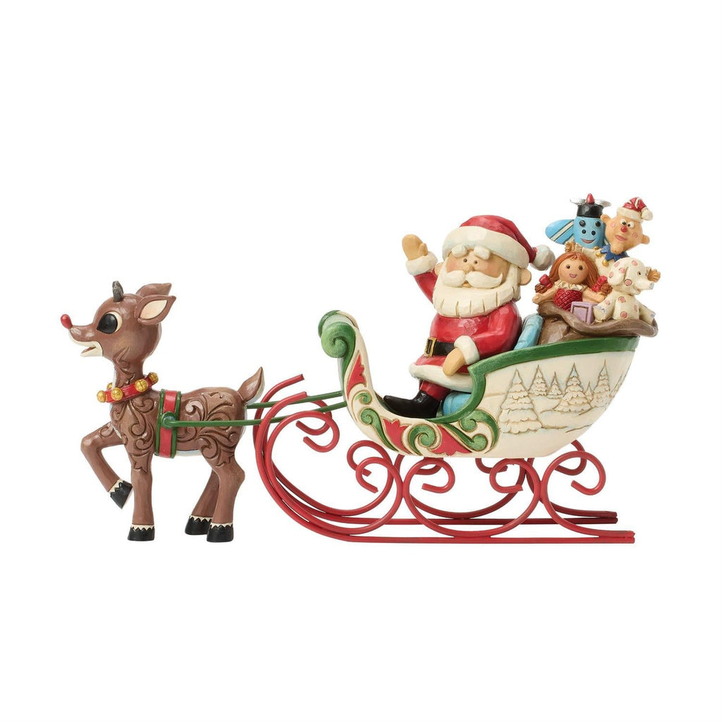 Rudolph pulls Santa in a Sleigh Figurine